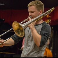 International competition-winning trombonist with a degree from the Eastman School of Music.